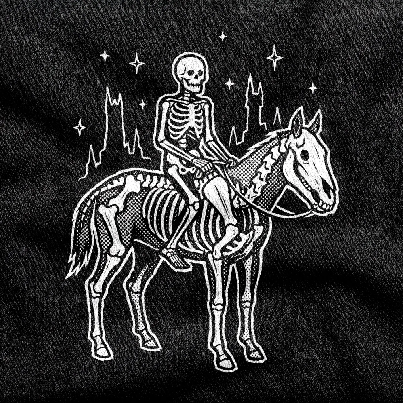 A skeleton riding a pale horse under cold stars, the fourth horseman at walking pace, white on a black tee.