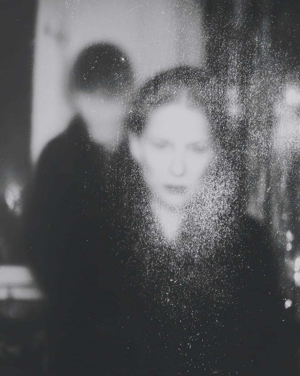 Grainy black-and-white image