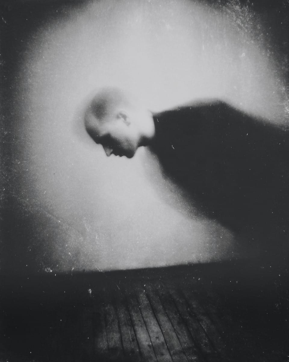 Grainy black-and-white image