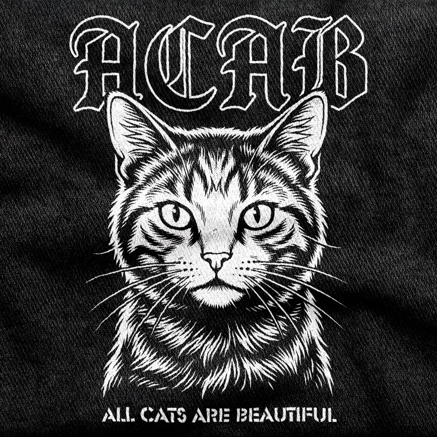 A front-facing tabby cat below blackletter caps reading "ACAB" and small caps reading "All Cats Are Beautiful", white on a black tee.