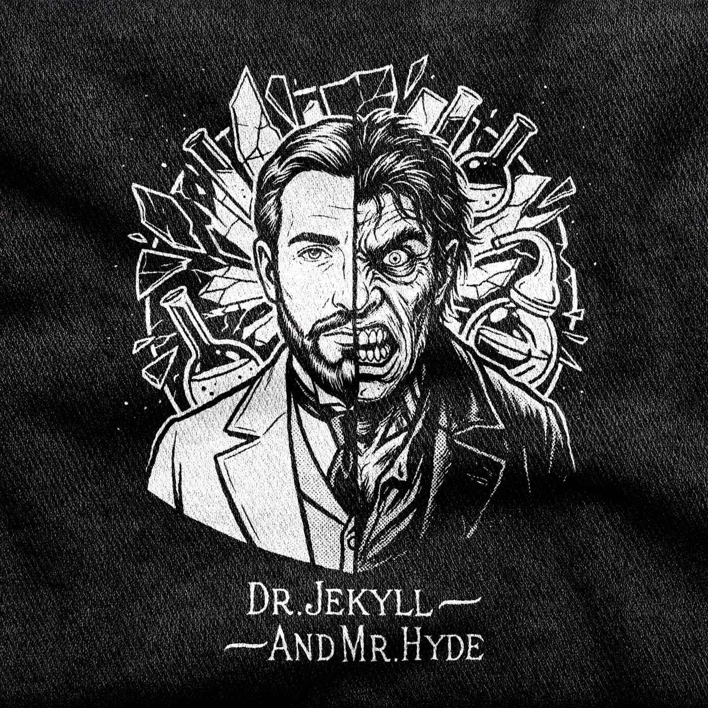 One face split down the middle, Dr. Jekyll in a lab coat on one side and Mr. Hyde snarling on the other, ringed by laboratory glassware and flying shards, white on a black tee.
