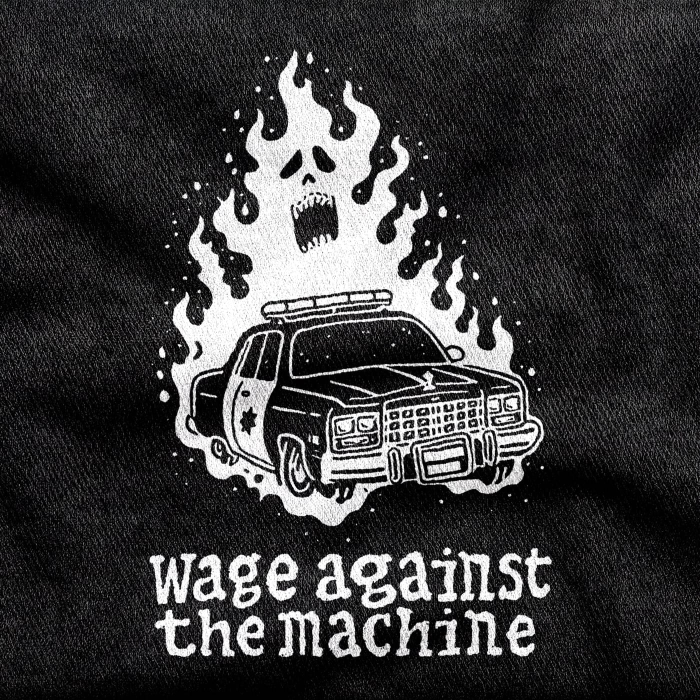 A burning police cruiser with the flames rising into a screaming skull, under lowercase hand-drawn type, white on a black tee.