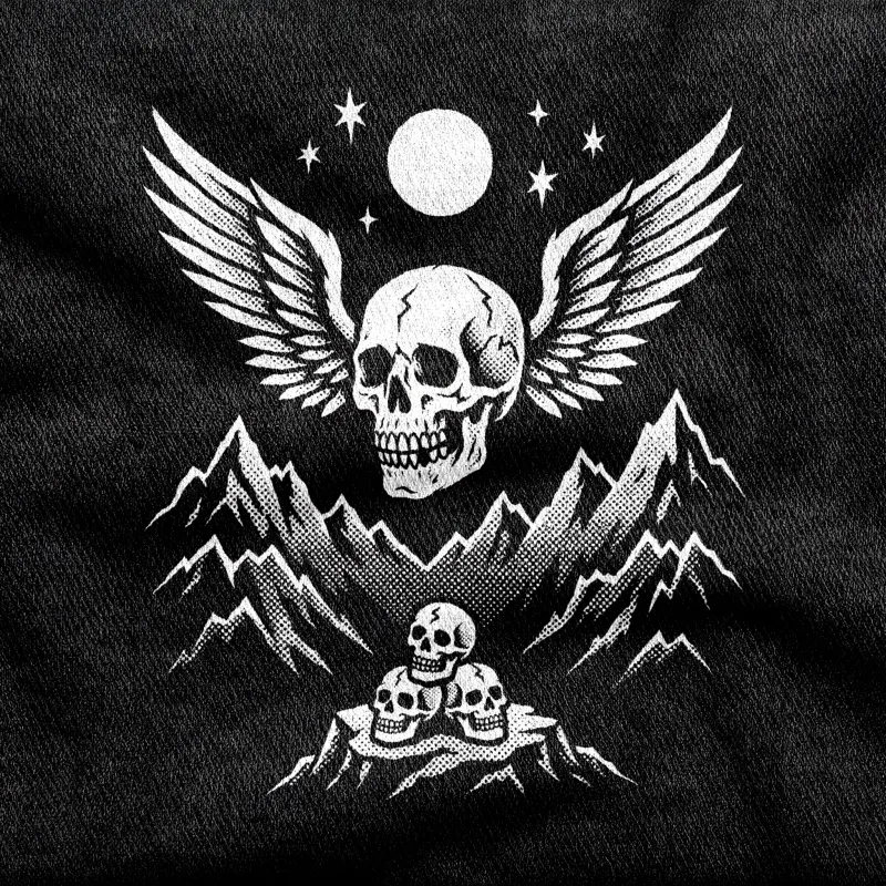 A winged skull over a field of small forgotten figures, the Bachdenkel cult-prog emblem, white on a black tee.