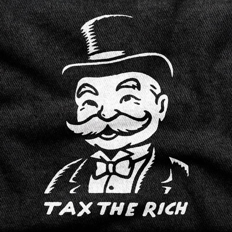 The slogan "Tax the Rich" in plain bold caps, white on a black tee.