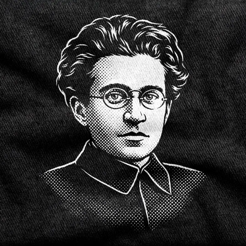 A portrait of the Italian Marxist Antonio Gramsci, white halftone on a black tee.