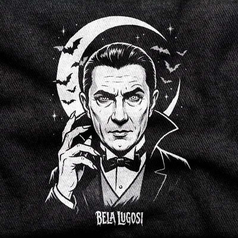 Bela Lugosi as the count in a high-collared cape beneath a crescent moon, bats scattering across the stars behind him, white on a black tee.